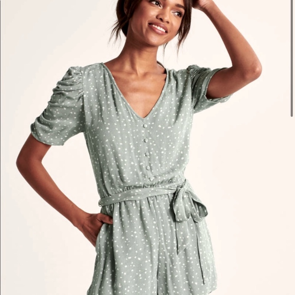 Green polka dot romper